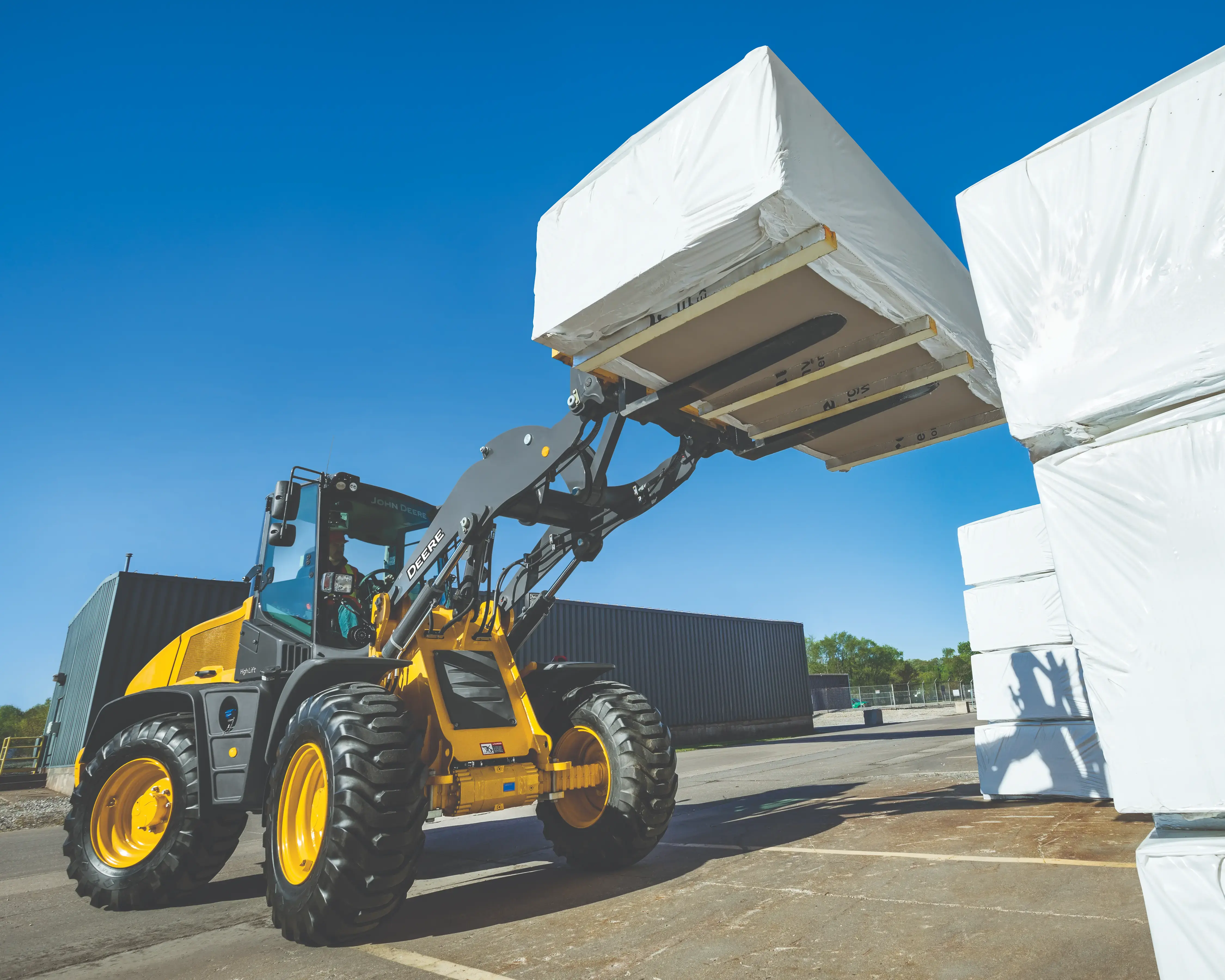 Which Attachments Are Available for John Deere Compact Construction Equipment?