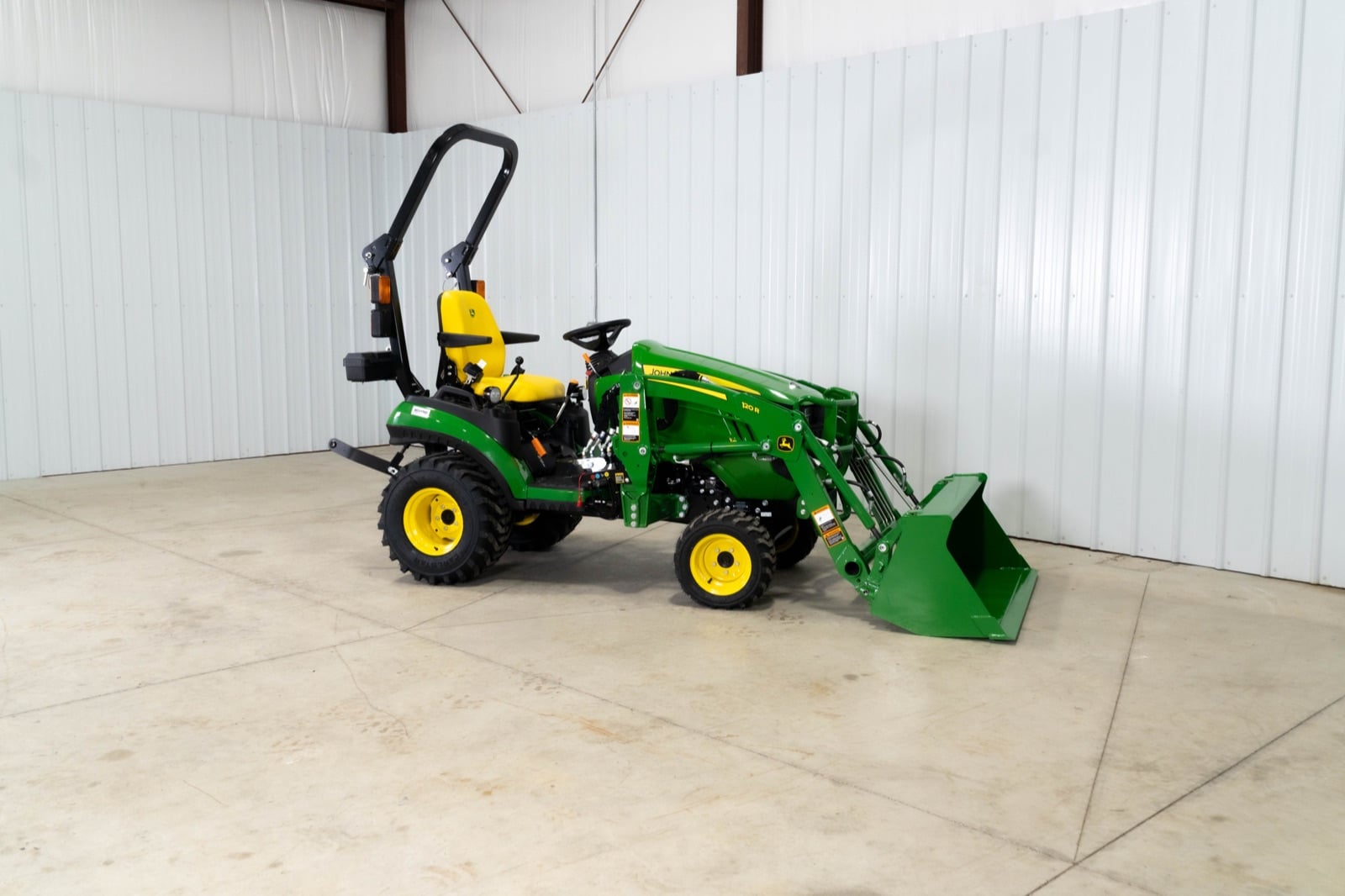 John Deere 1025R with a 120R loader, side view