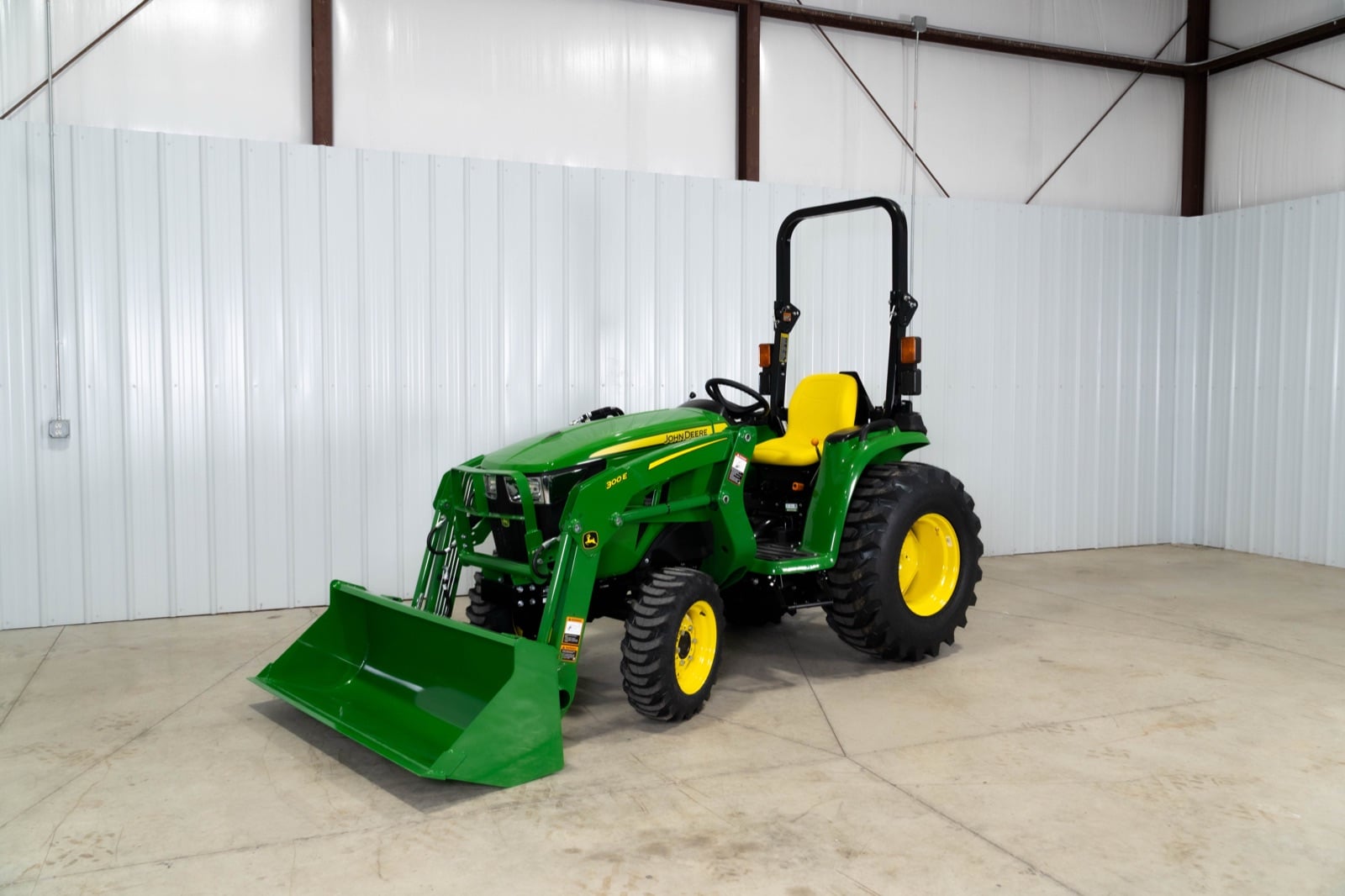 John Deere 3025E with a 300E loader in the Koenig studio
