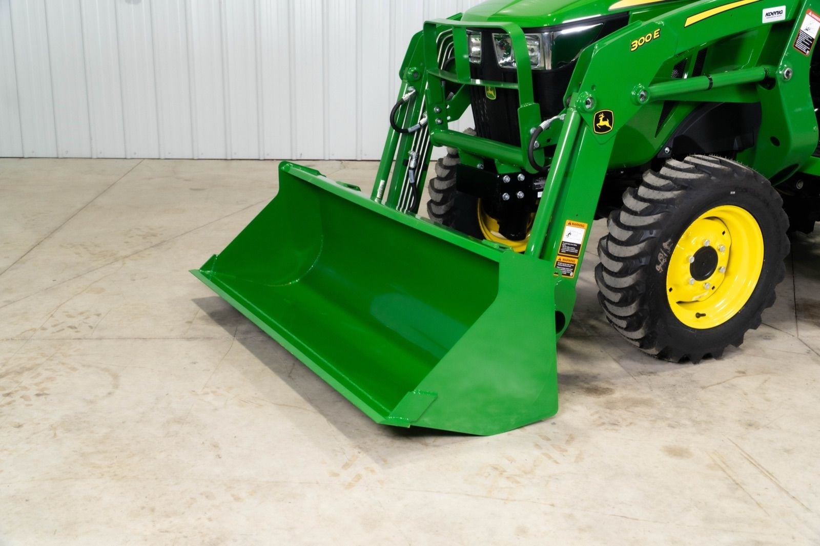 300E loader on a John Deere 3032E