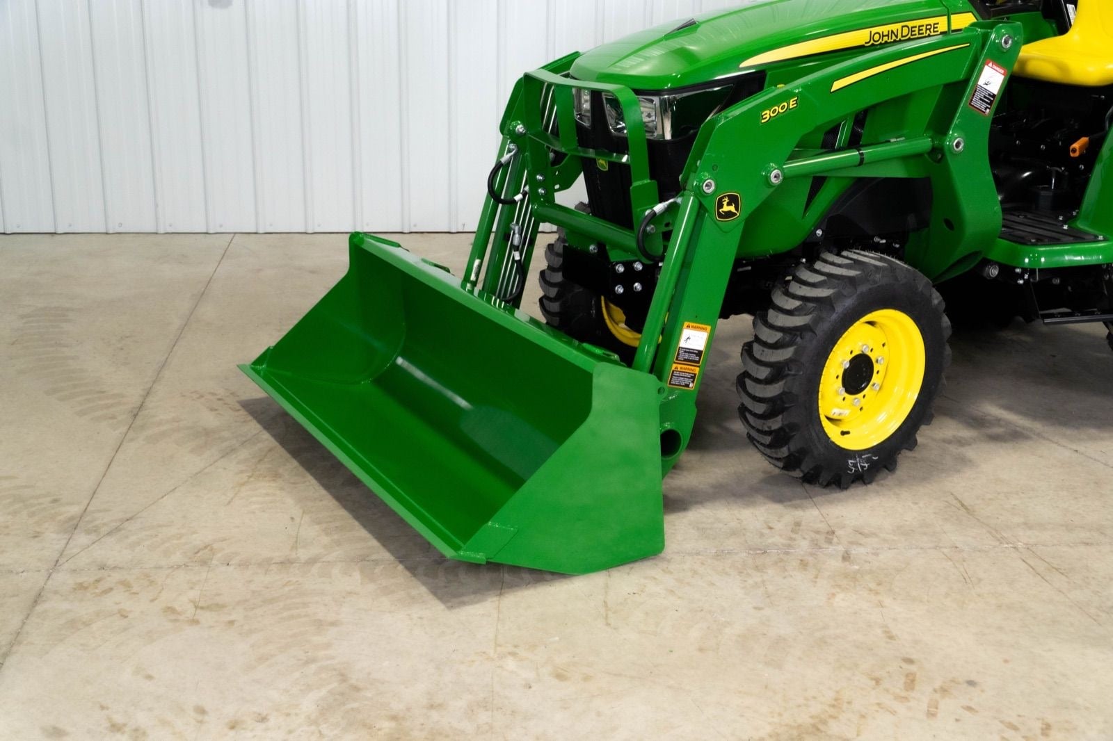 300E loader on a John Deere 3038E