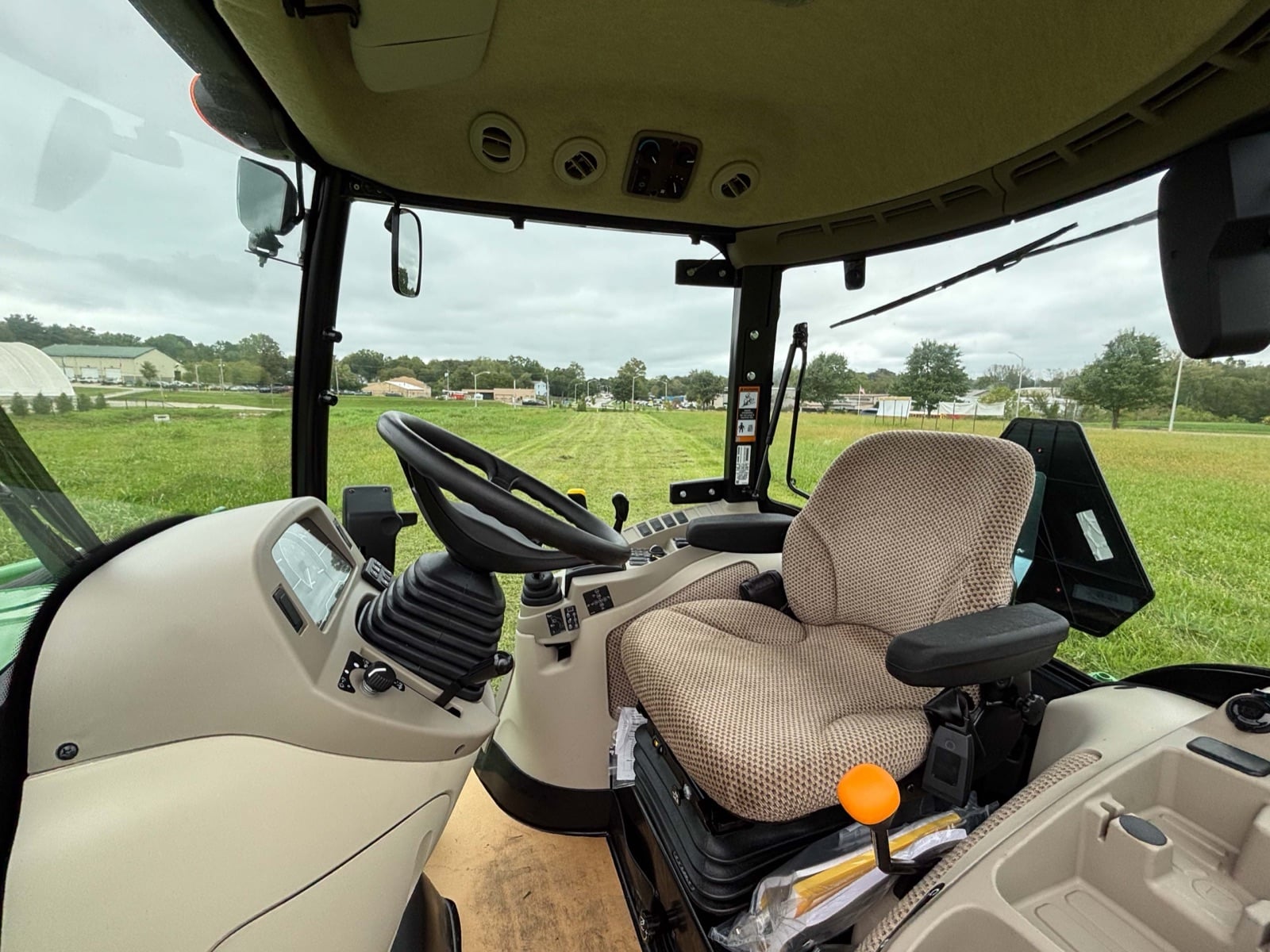 Inside the John Deere 3039R cab