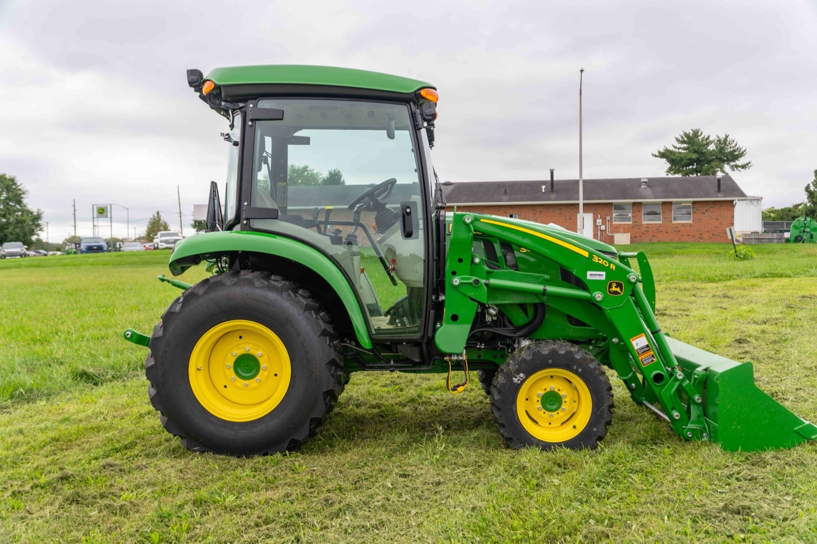 John Deere 3039R cab tractor, side view