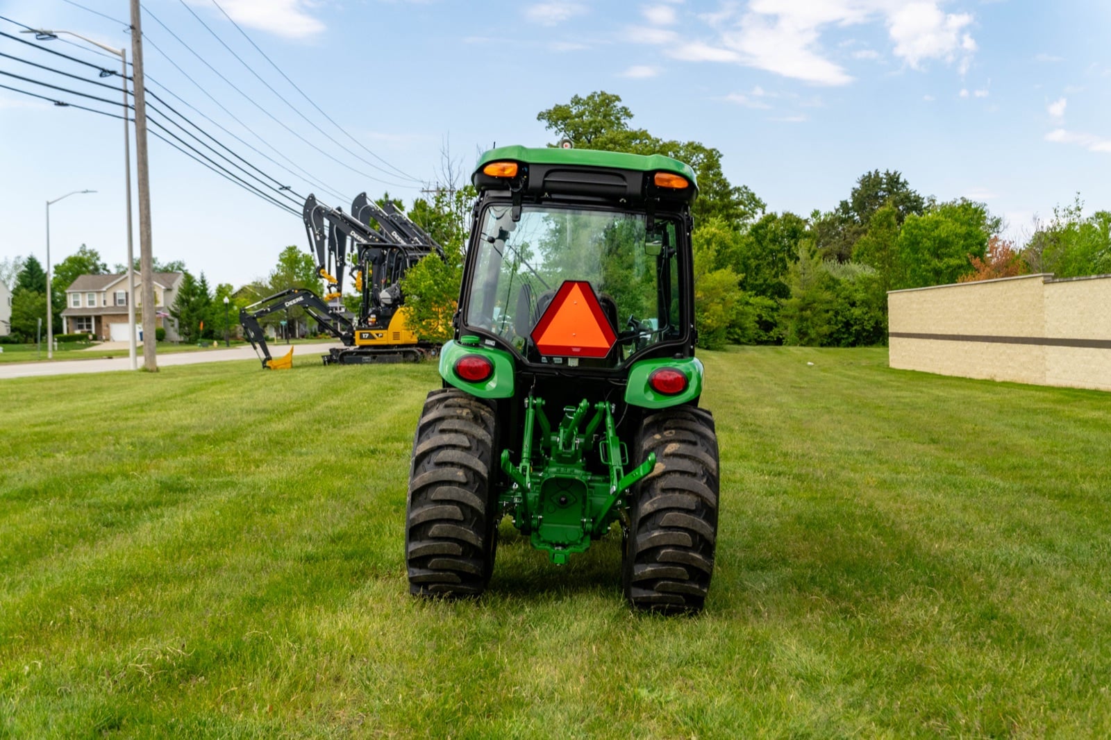 Rear view of a John Deere 3033R cab tractor