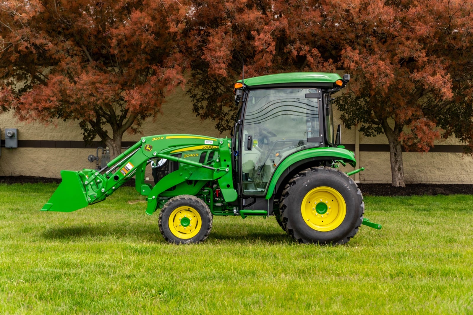 John Deere 3046R with a deluxe cab and 320R loader