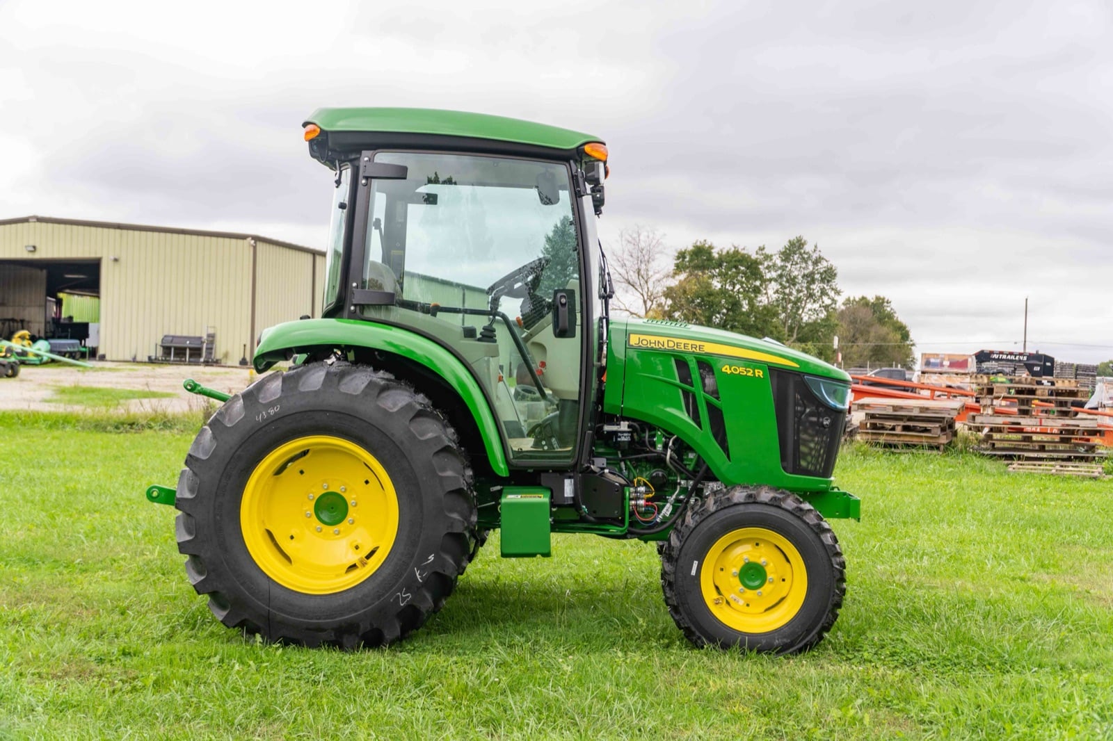 John Deere 4052R cab tractor, side view
