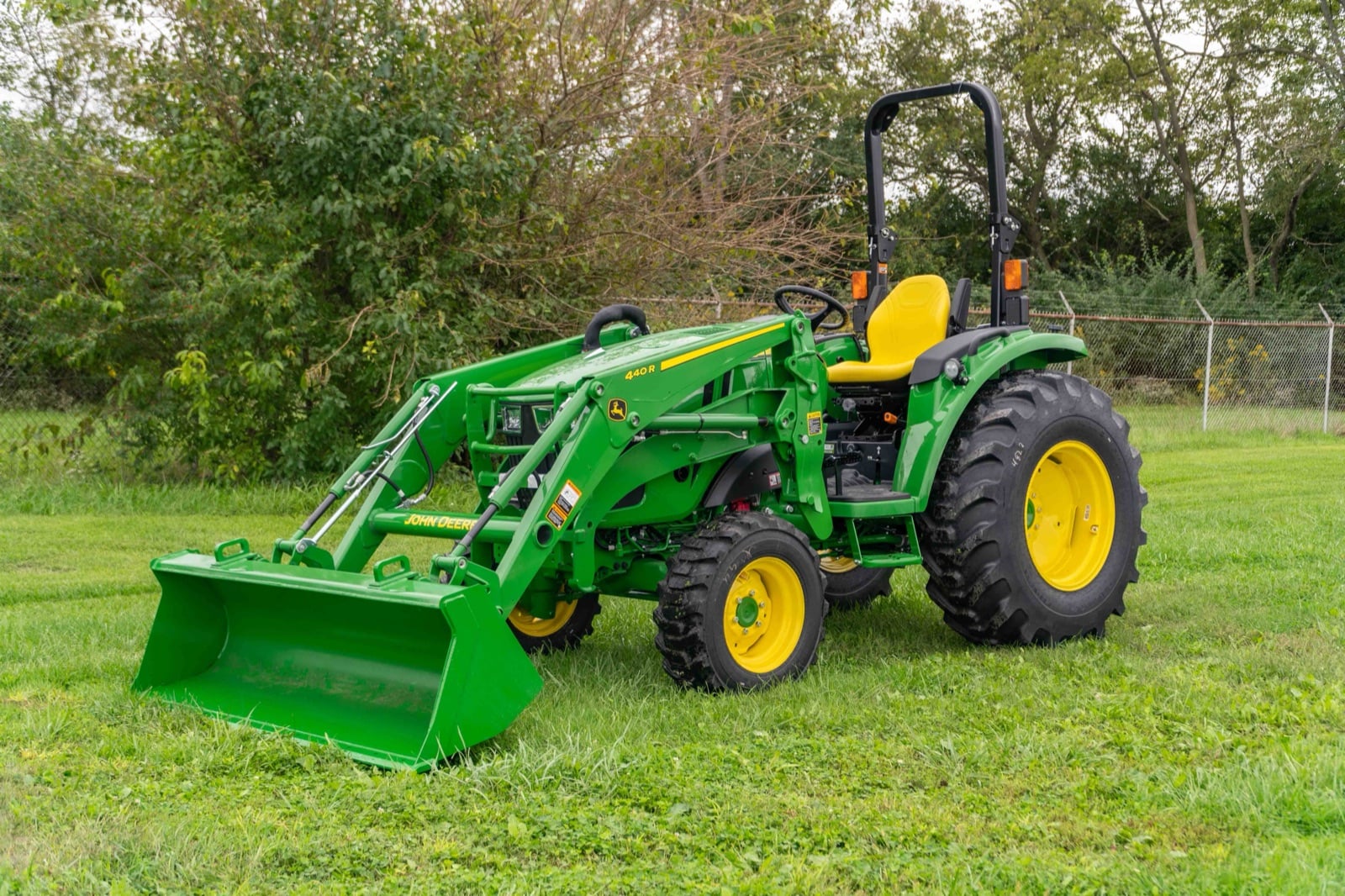 John Deere 4R Series tractor open station with a 440R loader (4066R shown)