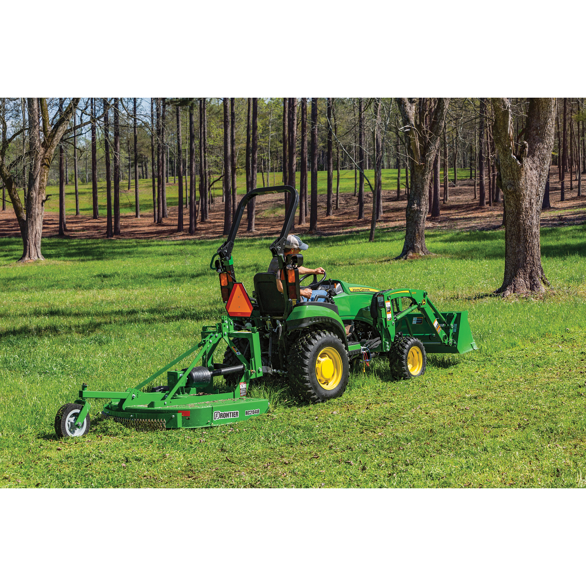 2025R Compact Tractor Cutting Grass Under Trees